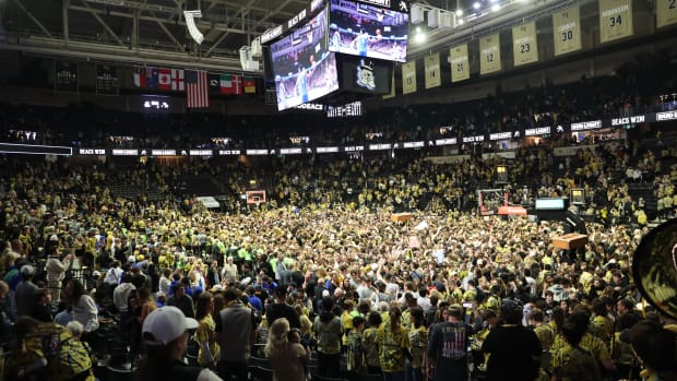 Wake Forest fans celebrate the Demon Deacons’ 83-79 win over No. 8 Duke on Feb. 24, 2024.